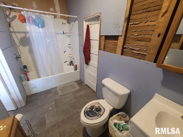 bathroom featuring vanity and shower / tub combo