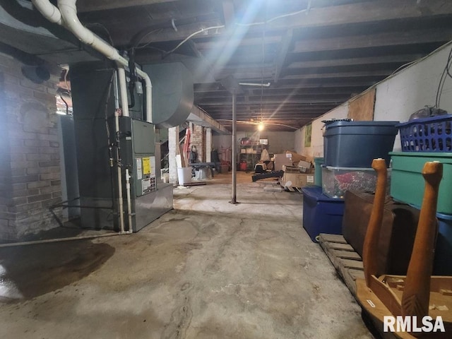 basement featuring heating unit