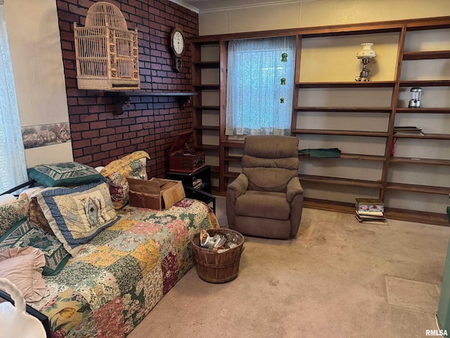 carpeted living room featuring crown molding and brick wall