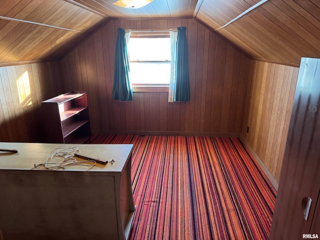 bonus room featuring vaulted ceiling, wooden ceiling, and wood walls