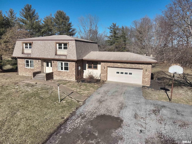 prairie-style home with a garage and a front lawn