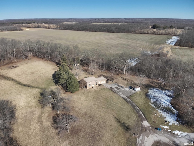 birds eye view of property with a rural view and a water view