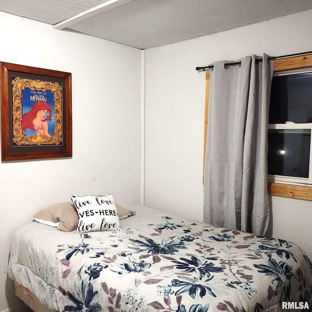 bedroom with a textured ceiling