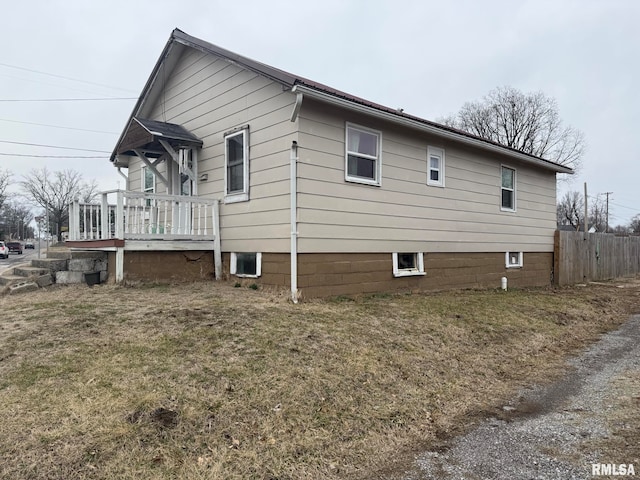 view of home's exterior featuring a yard