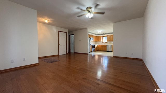 unfurnished living room with hardwood / wood-style flooring and ceiling fan