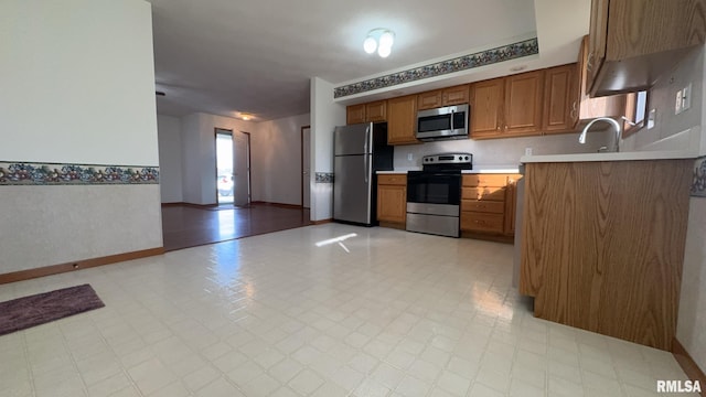 kitchen featuring sink and appliances with stainless steel finishes