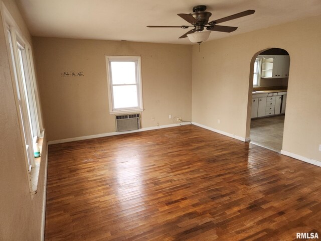 kitchen with sink, white cabinets, and black dishwasher