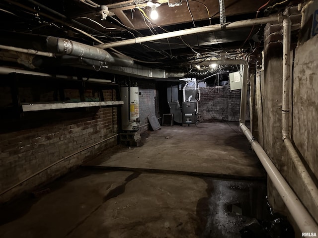 basement with heating unit and gas water heater