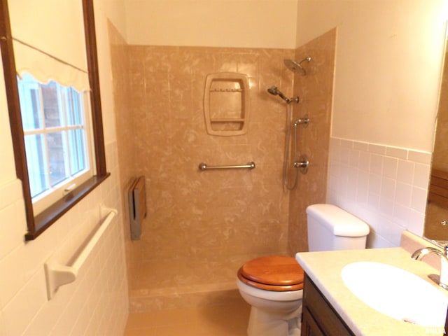 1723 Walnut Hill Rd, Centralia, IL 62801 - full bathroom featuring tile walls, vanity, a shower, wainscoting, and tile patterned flooring