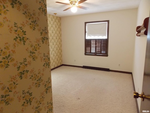 1723 Walnut Hill Rd, Centralia, IL 62801 - spare room with ceiling fan and carpet flooring