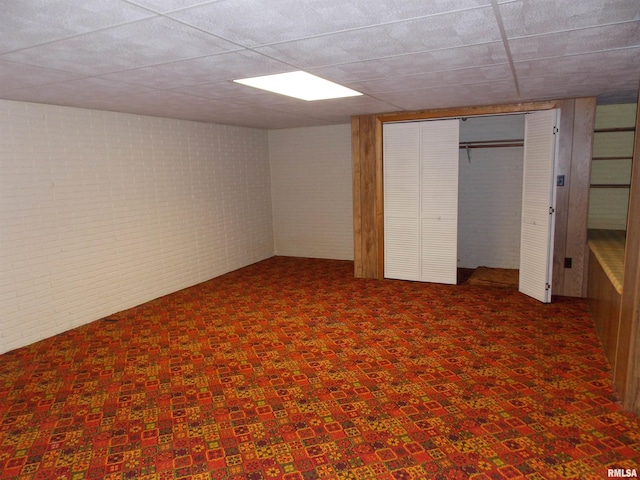1723 Walnut Hill Rd, Centralia, IL 62801 - unfurnished bedroom with brick wall, carpet flooring, and a closet