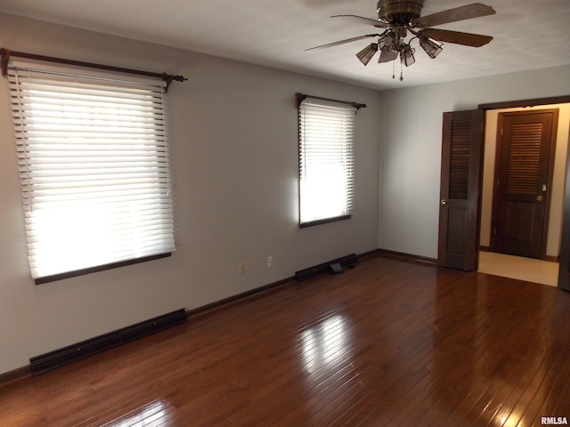 1723 Walnut Hill Rd, Centralia, IL 62801 - spare room featuring a ceiling fan and hardwood / wood-style flooring