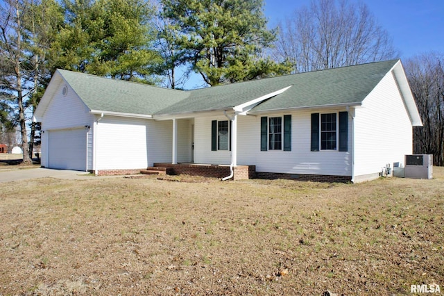 single story home featuring a garage, a front lawn, and covered porch