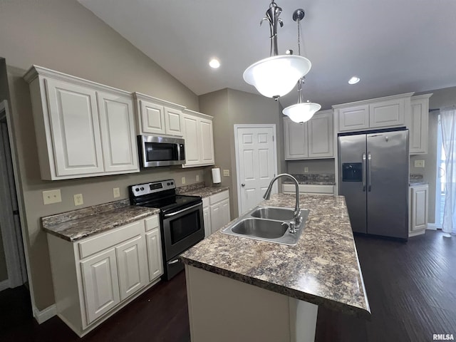 kitchen with sink, an island with sink, and appliances with stainless steel finishes