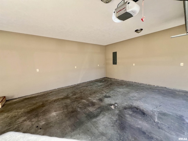 garage with a garage door opener and electric panel