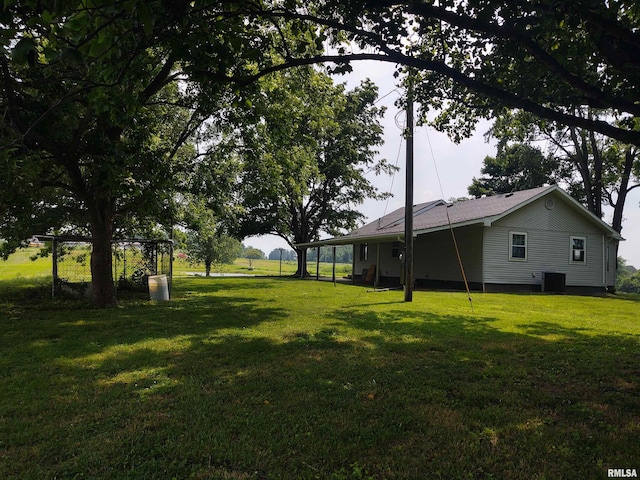 8027 Shawnee College Rd, Ullin, IL 62992 - view of green lawn with central AC unit
