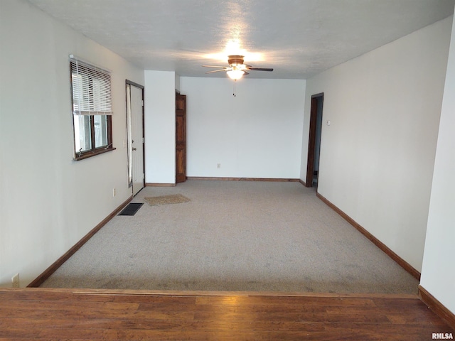 8027 Shawnee College Rd, Ullin, IL 62992 - unfurnished room with ceiling fan, baseboards, and carpet flooring