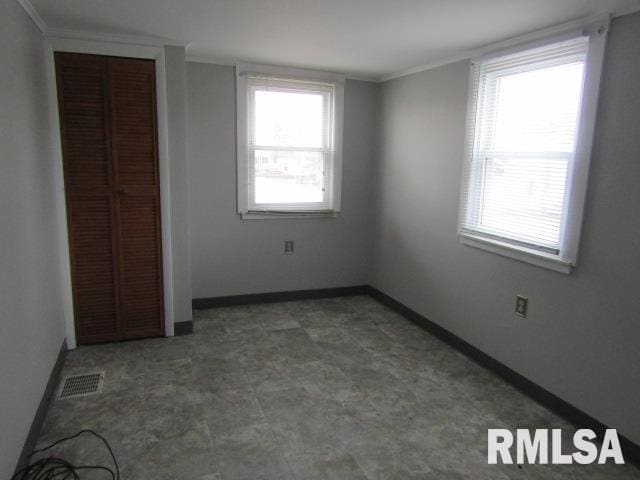 602 4th St, Rosiclare, IL 62982 - unfurnished room with crown molding