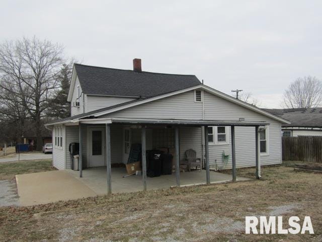602 4th St, Rosiclare, IL 62982 - rear view of house featuring a patio