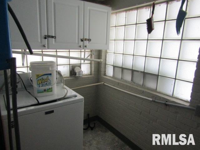 602 4th St, Rosiclare, IL 62982 - washroom with cabinets and washer / clothes dryer