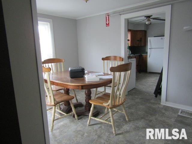 602 4th St, Rosiclare, IL 62982 - dining area with crown molding and ceiling fan