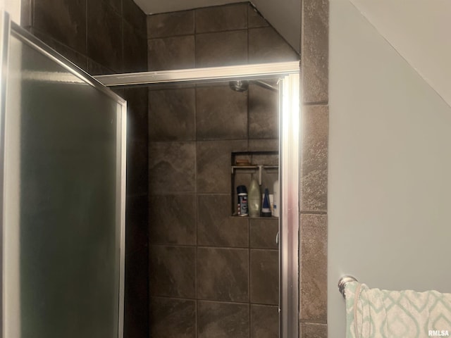 bathroom featuring an enclosed shower