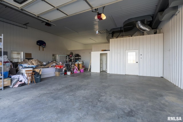 garage featuring a garage door opener