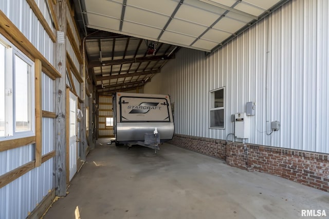 garage featuring a carport