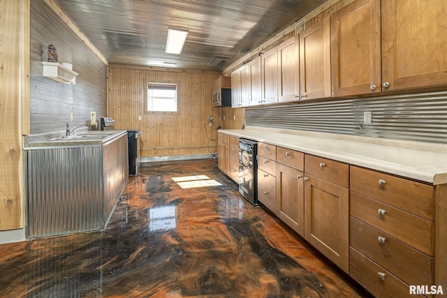 kitchen featuring sink, electric range, wooden ceiling, and wood walls