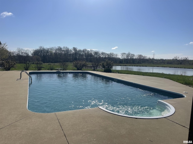 pool featuring a patio and a diving board