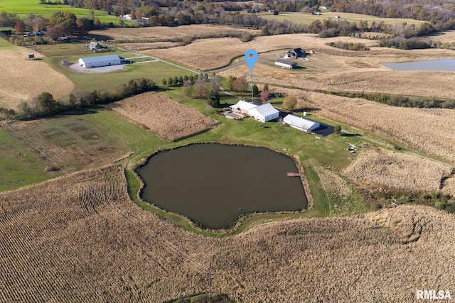 birds eye view of property featuring a water view and a rural view