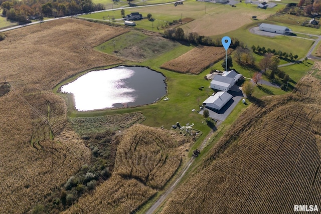 bird's eye view featuring a water view and a rural view