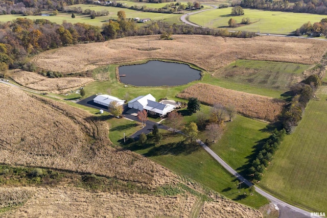 drone / aerial view featuring a water view and a rural view