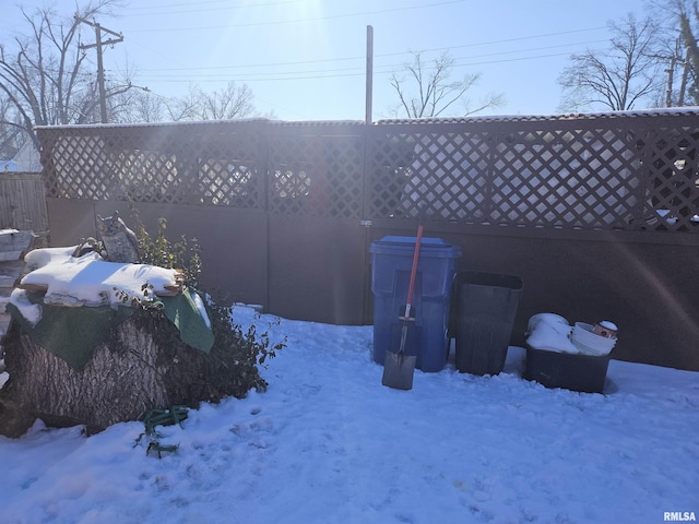 view of yard covered in snow