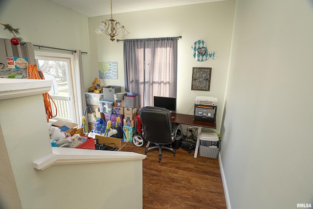 office space with dark hardwood / wood-style floors and a notable chandelier