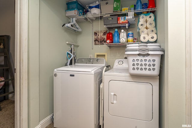 laundry area featuring washing machine and dryer