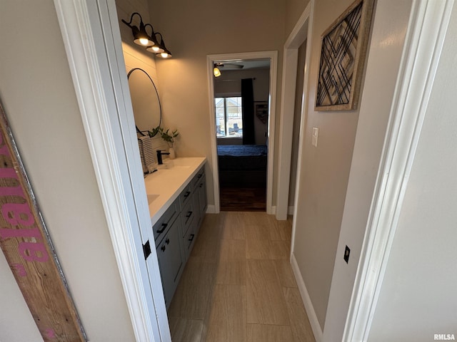 bathroom featuring vanity and wood-type flooring