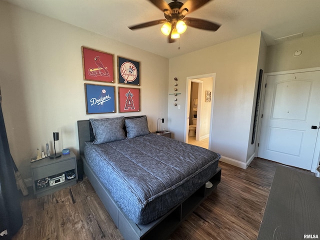 bedroom featuring dark wood-type flooring and ceiling fan