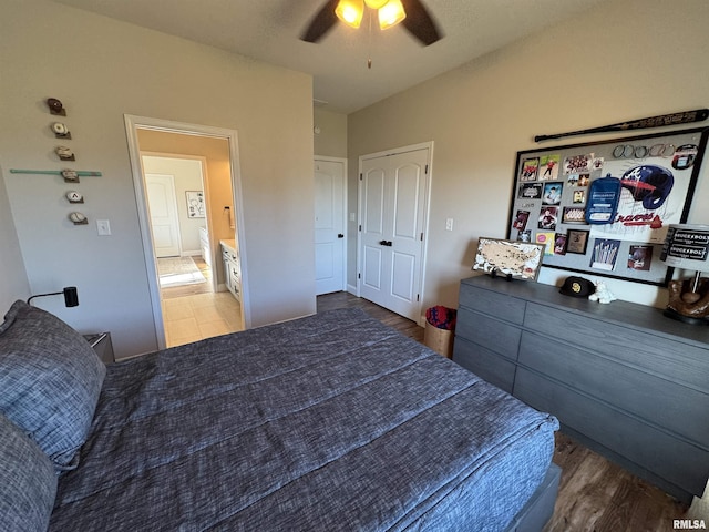 bedroom featuring hardwood / wood-style floors and ceiling fan