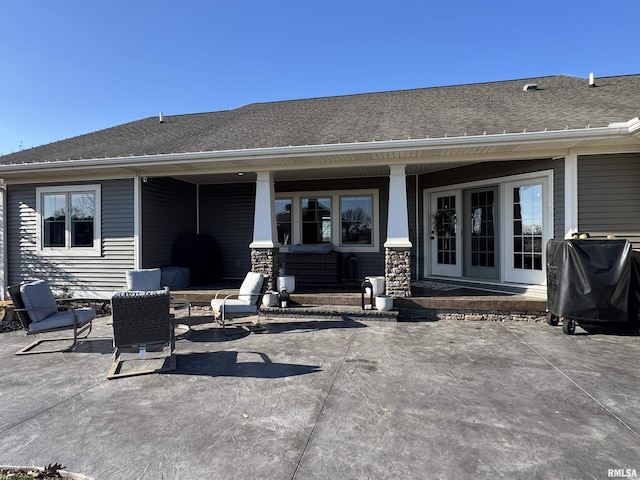 rear view of house with a patio