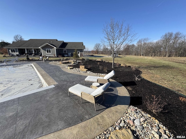 exterior space featuring a patio and a lawn