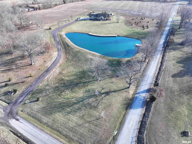 birds eye view of property with a rural view