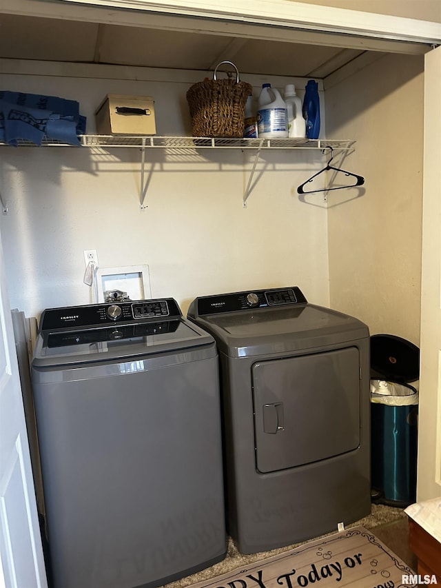 laundry room featuring washing machine and clothes dryer