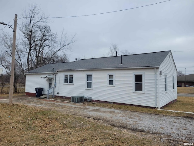 back of property featuring central air condition unit