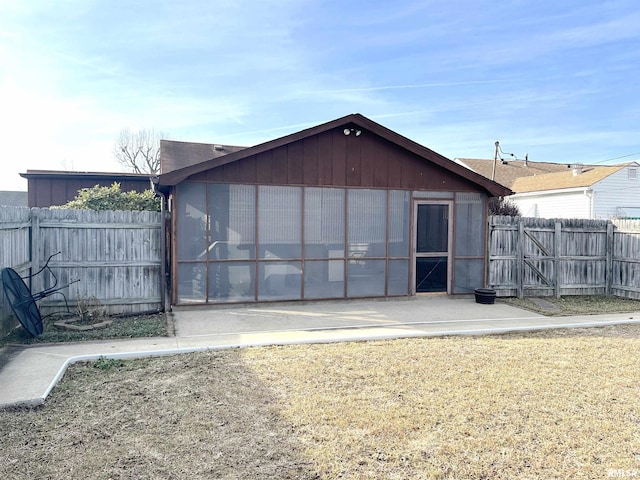 rear view of property featuring a patio area