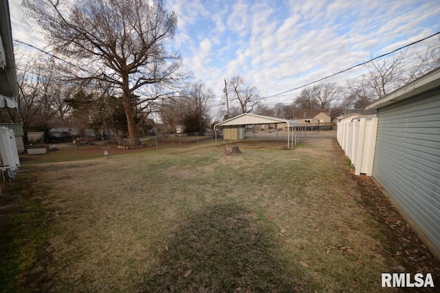 view of yard featuring a carport