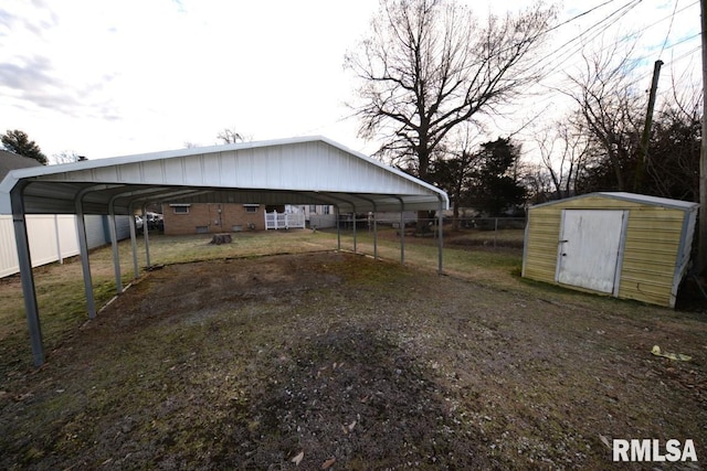 view of yard featuring a carport and a shed