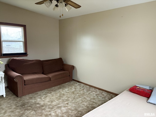 living room featuring light carpet and ceiling fan