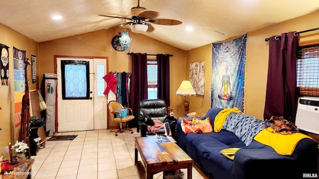 tiled living room with ceiling fan and lofted ceiling