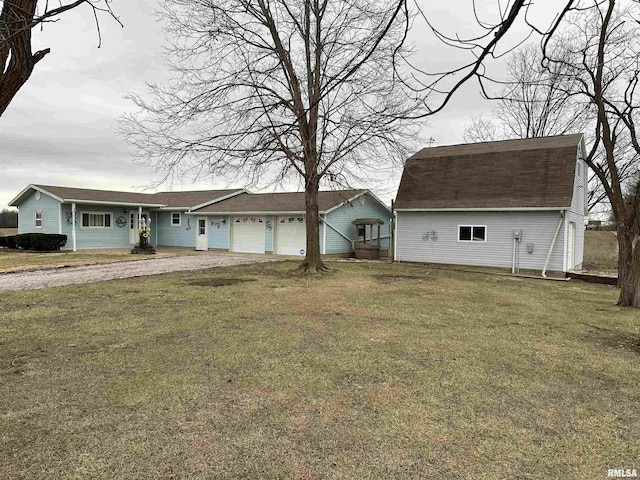 single story home with a garage and a front lawn